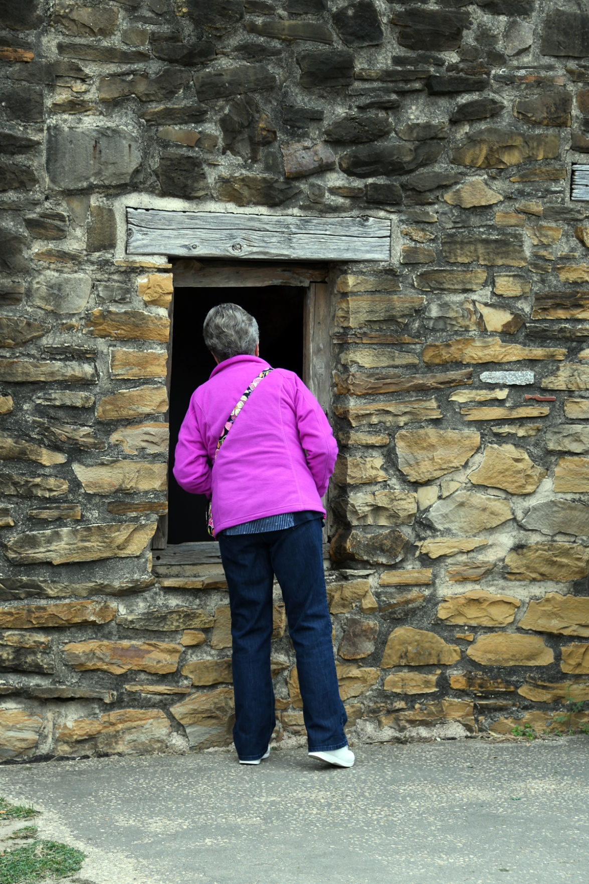103 Anita Wochner checks out the Indian accommodations at the San Jose mission.JPG